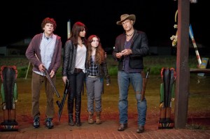 Tallahassee (Woody Harrelson), Columbus (Jesse Eisenberg), Wichita (Emma Stone) and Little Rock (Abigail Breslin) standing next to each other.