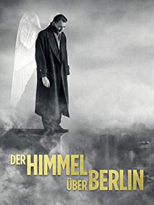 Film poster showing Bruno Ganz with wings looking of a the edge of a skyscraper. 