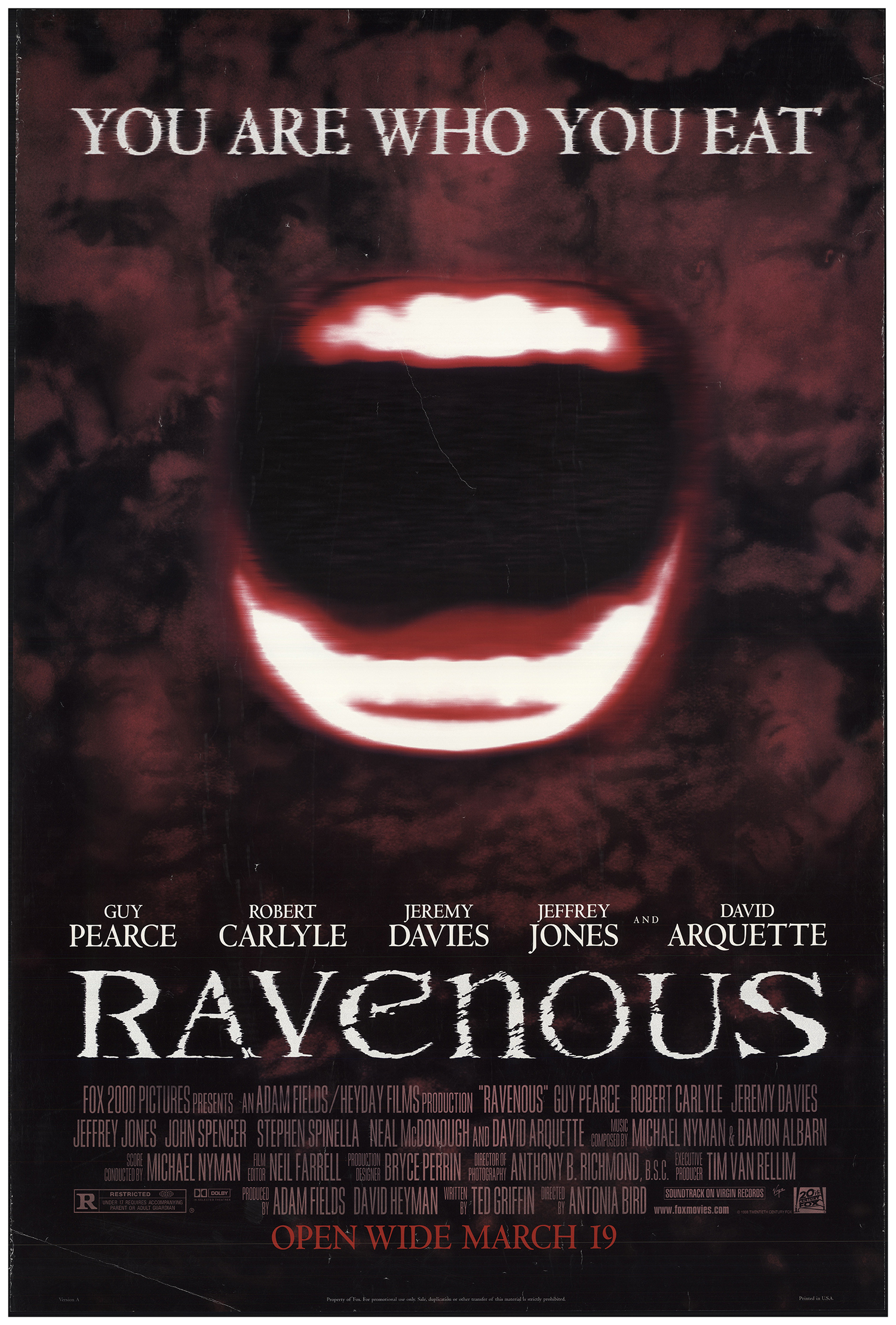 The film poster showing an opened mouth. 