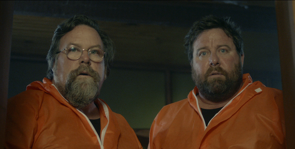 Clayton and Shane Jacobson in the film.