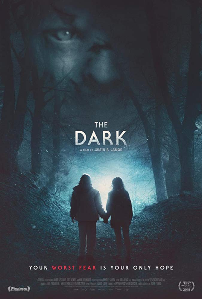 The film poster showing the silhouettes of two kids holding hands in the woods.