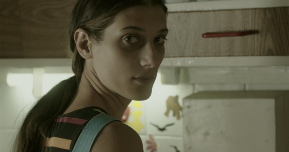 Marijana (Mia Petricevic) looking back over her shoulder.