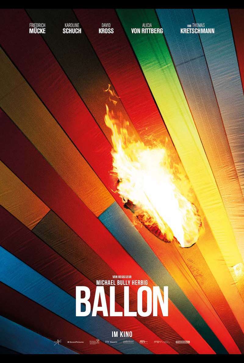 The film poster showing balloon silk burning.
