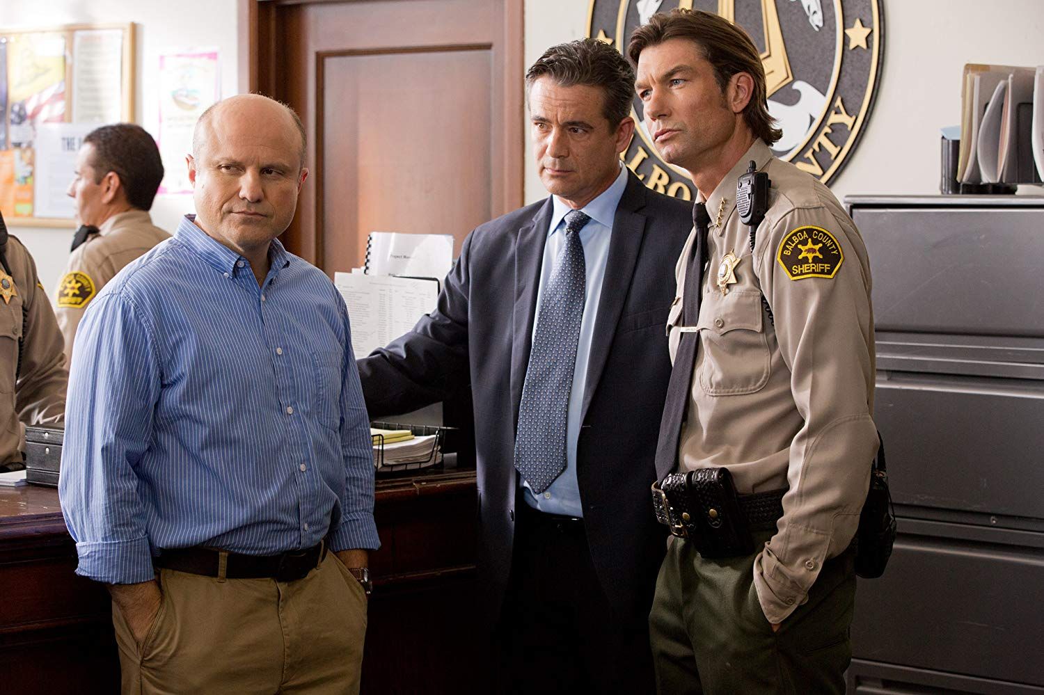 Keith Mars (Enirco Colantoni) with Cliff McCormack (Daran Norris) and Sheriff Dan Lamb (Jerry O'Connell).