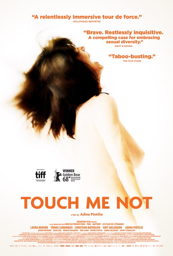 The film poster showing the upper body of a naked woman, throwing her head back mid-orgasm.