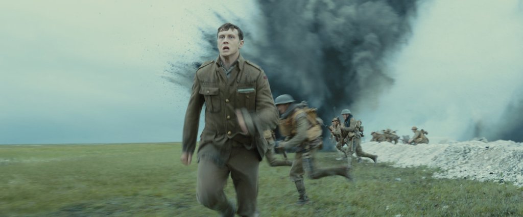 Lance Corporal Schofield (George MacKay) running along the trenches.