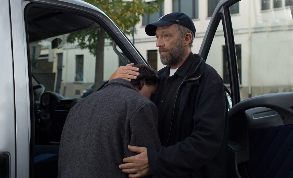 Burno (Vincent Cassel) comforting Joseph (Benjamin Lessieur). 