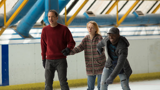 Malik (Reda Kateb) and Fabrice (Djibril Yoni) ice-skating with a client, a young woman.
