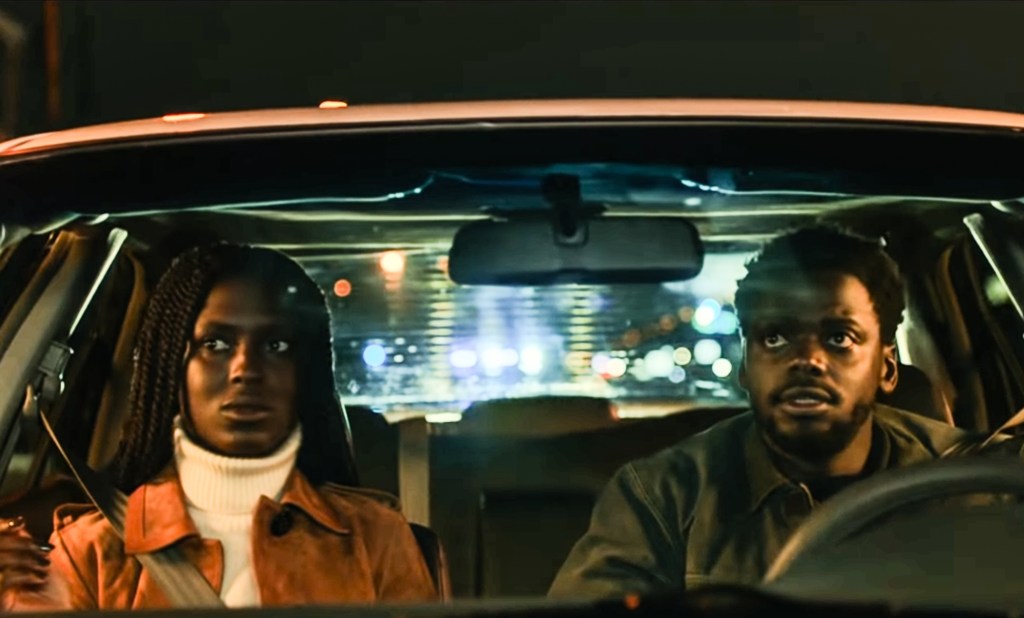 Queen (Jodie Turner-Smith) and Slim (Daniel Kaluuya) in a car. 