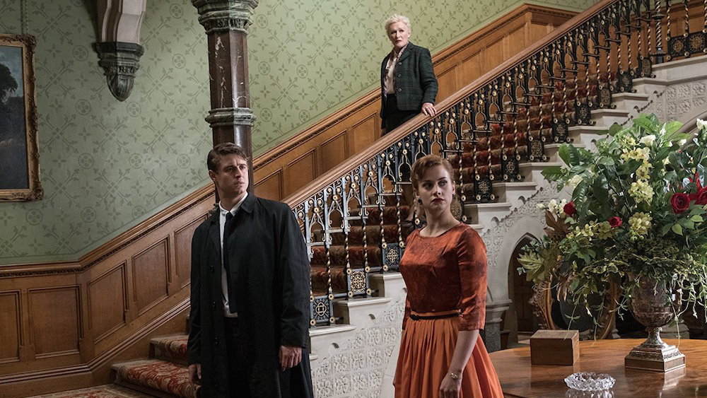 Charles Hayward (Max Irons), Lady Edith de Haviland (Glenn Close) and Sophia de Haviland (Stefanie Martini) in the manor's entrance hall.