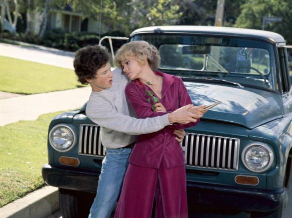 Mrs Andrews (Barbara Harris) getting a boomerang lesson from Boris (Marc McClure). 