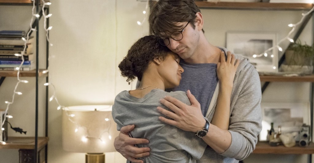 Sam (Michiel Huisman) and Abbie (Gugu Mbatha-Raw) dancing.