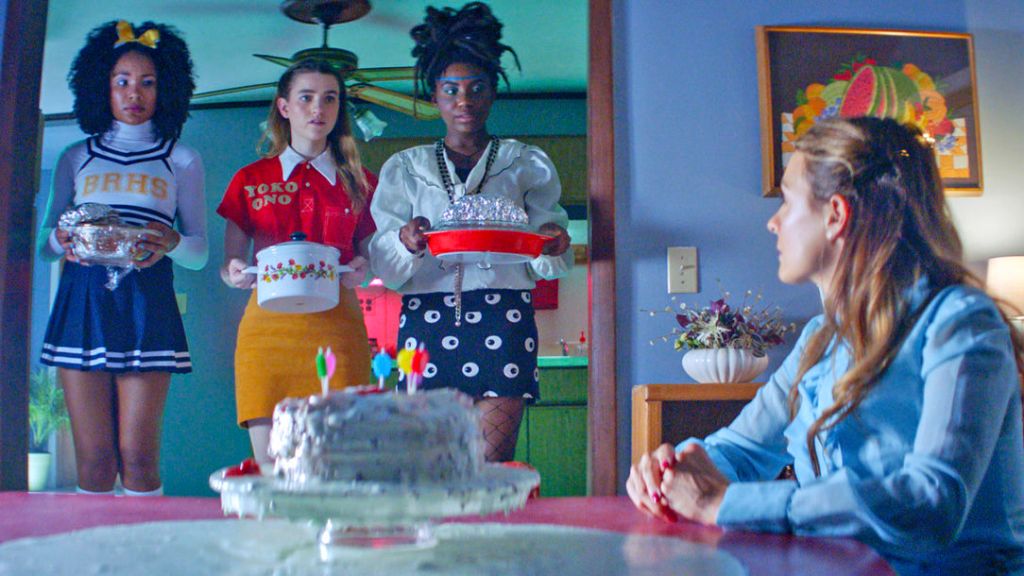 Laurel (Kayla Carter), Joanna (Grace Smith) and Charlotte (Ireon Roach) bringing Lisa Harper (Marika Engelhardt) casseroles.