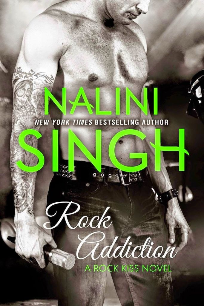 The book cover showing a shirtless guy with a tattoed arm and a microphone in his hand.