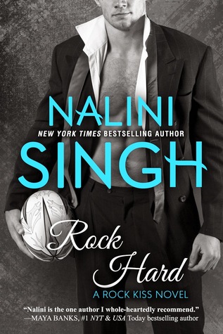The book cover showing a guy in a suit, tie undone, shirt open, holding an American football.
