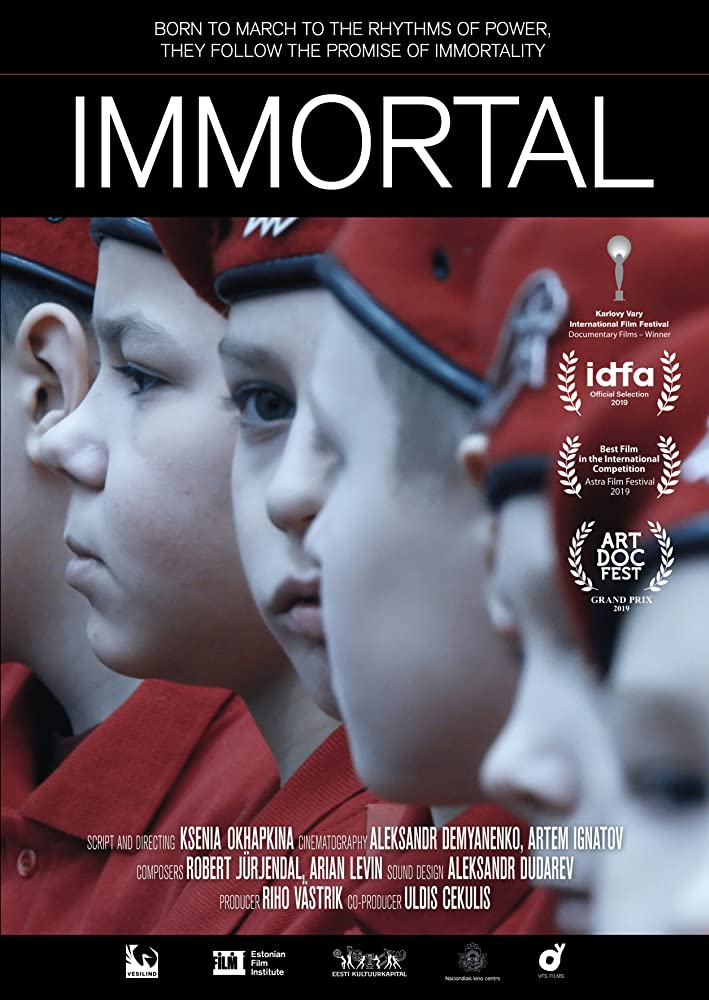 The film poster showing a group of boys dressed in red uniforms. 