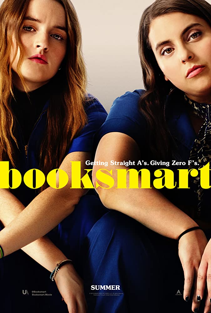 The film poster showing Molly (Beanie Feldstein) and Amy (Kaitlyn Denver) in matching overalls.