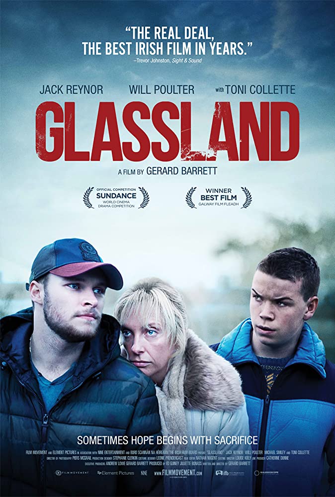 The film poster showing Jean (Toni Collette) leaning against John (Jack Reynor), Shane (Will Poulter) standing behind them. 