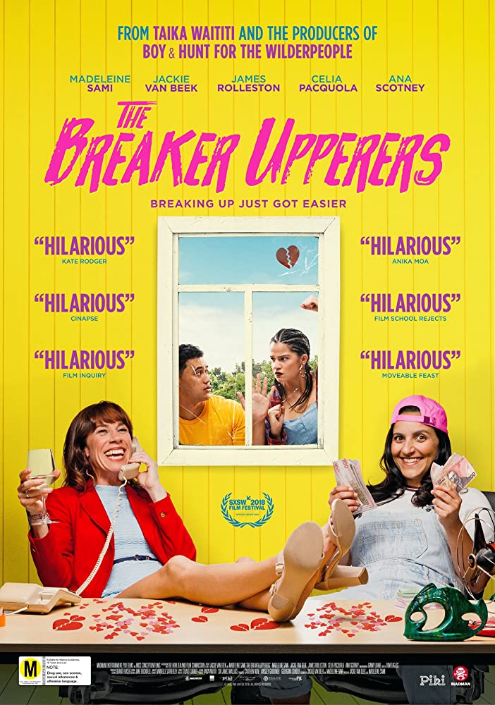 The film poster showing Mel (Madeleine Sami) and Jen (Jackie van Beek) sittingat a desk with champagne and cash. Behind them Jordan (James Rolleston) and Sepa (Ana Scotney) look in through a window. 