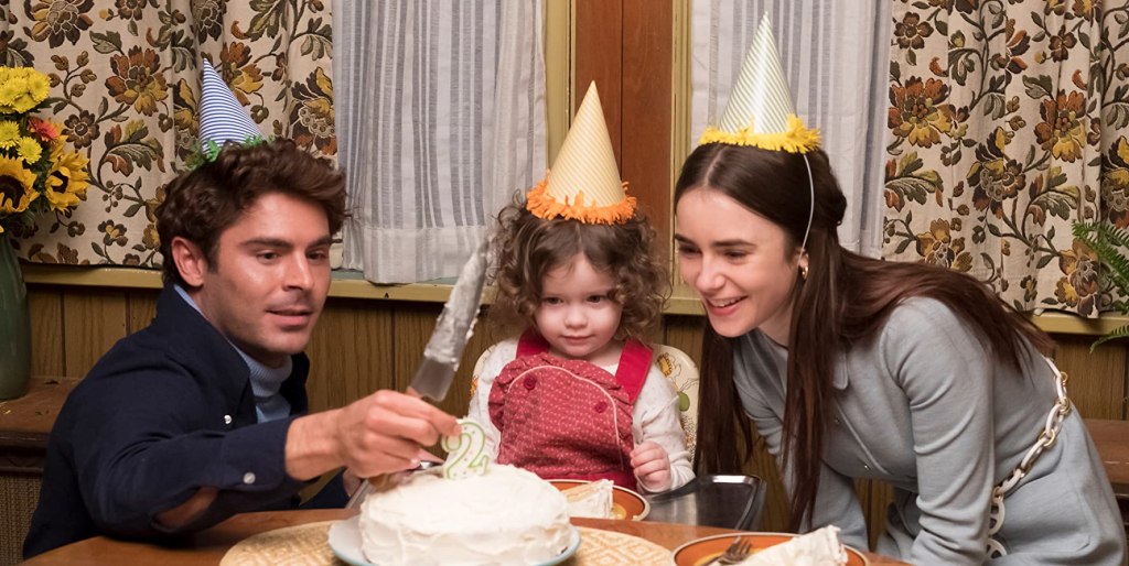 Ted (Zac Efron) and Liz (Lily Collins) celebrating their daughter's birthday.