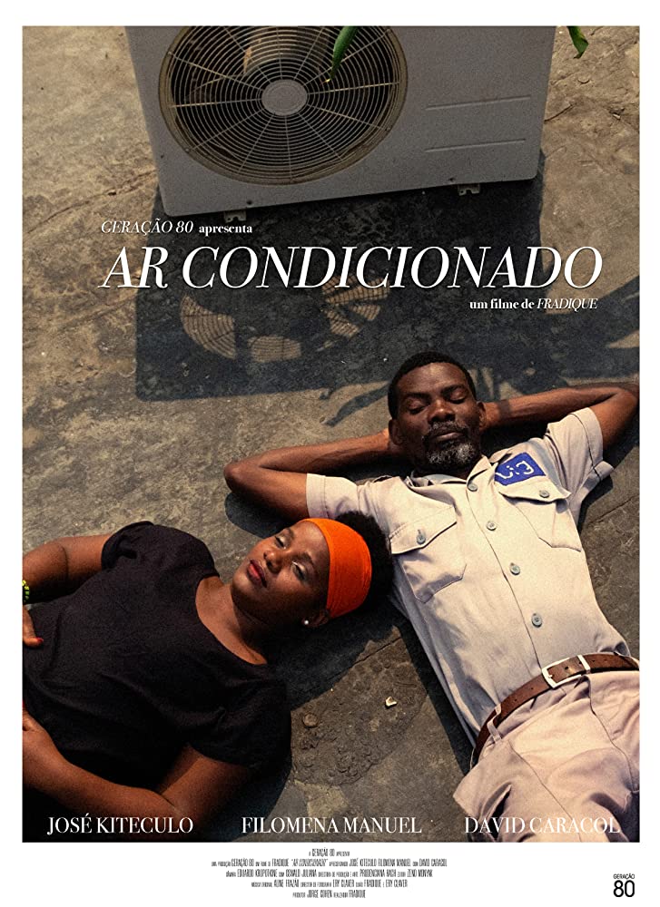 The film poster showing Zézinha (Filomena Manuel) and Matacedo (José Kiteculo) lying next to an air conditioner. 