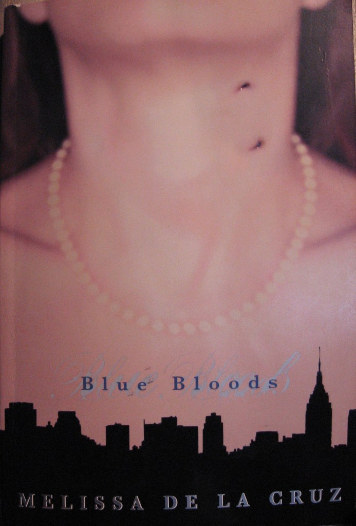 The book cover showing a neck with a pearl necklace and bloody vampire bite marks.