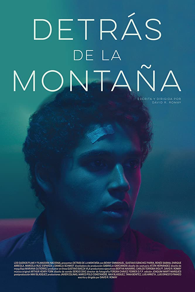 The film poster showing Miguel (Benny Emmanuel) with a bandaid on his forehead in blue-green-pink lighting.
