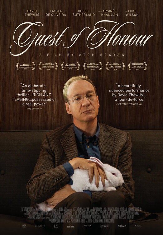 The film poster showing Jim (David Thewlis) stroking a white rabbit.
