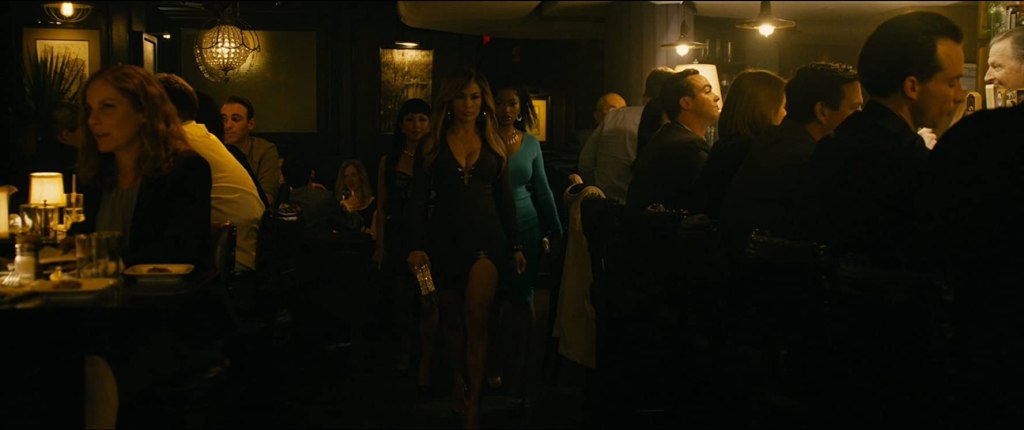 Ramona (Jennifer Lopez) walking with Destiny (Constance Wu) and Mercedes (Keke Palmer) into a bar.