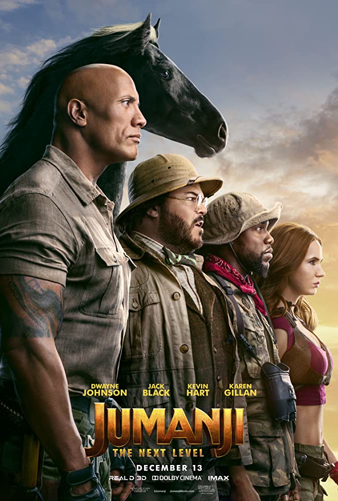 The film poster showing Bravestone (Dwayne Johnson), Oberon (Jack Black), Mouse (Kevin Hart) and Ruby (Karen Gillan) standing with a black  horse at their backs