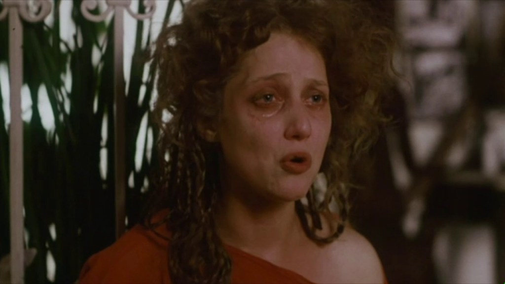 Cissy (Carol Kane) is distraught.