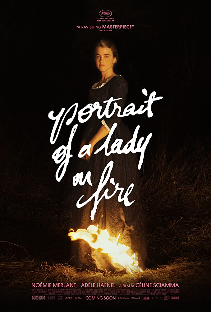 The film poster showing Héloïse (Adèle Haenel) standing in the dark, the bottom of her long dress on fire.