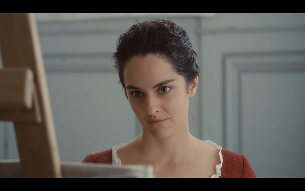 Marianne (Noémie Merlant) painting.