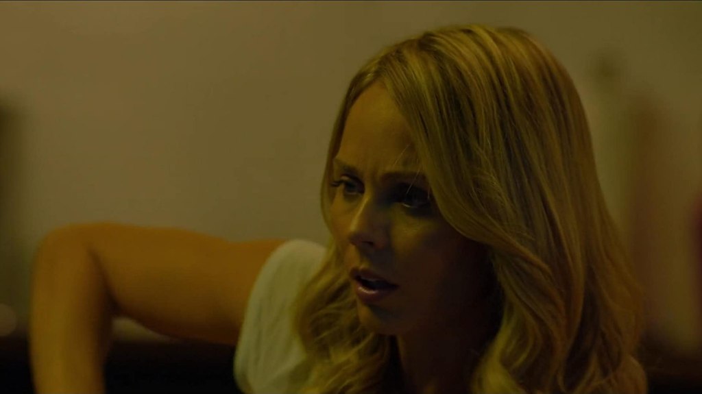 Rose (Laura Vandervoort) looking distraught.