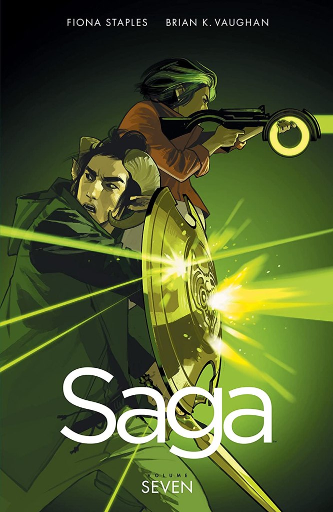 The cover showing Marko defending himself from gunfire with a shield and Alana shooting back. 