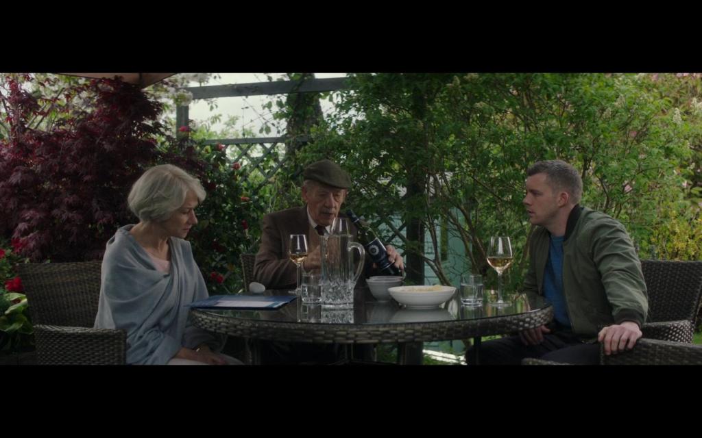 Betty (Helen Mirren), Roy (Ian McKellen) and Stephen (Russell Tovey) eating together.