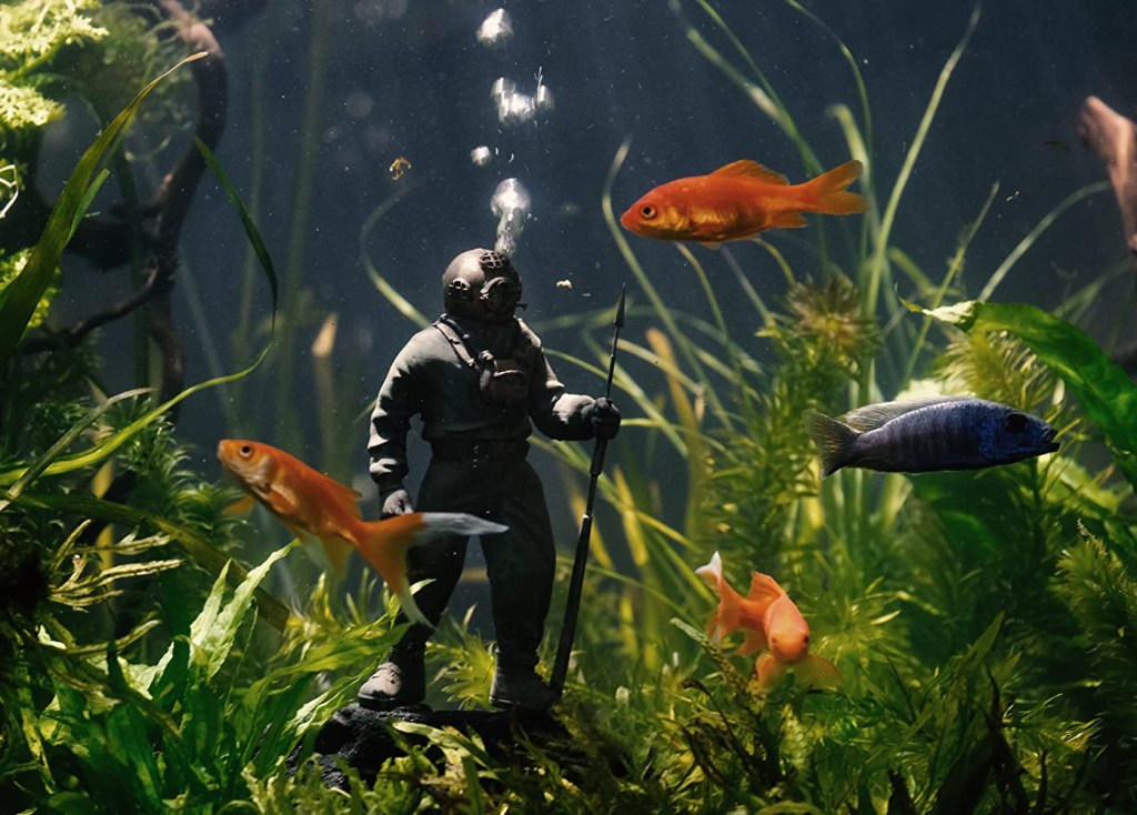 A figure of a diver in an aquarium.