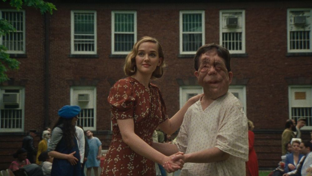 Mabel (Jess Weixler) and Rosenthal (Adam Pearson) in dancing position.