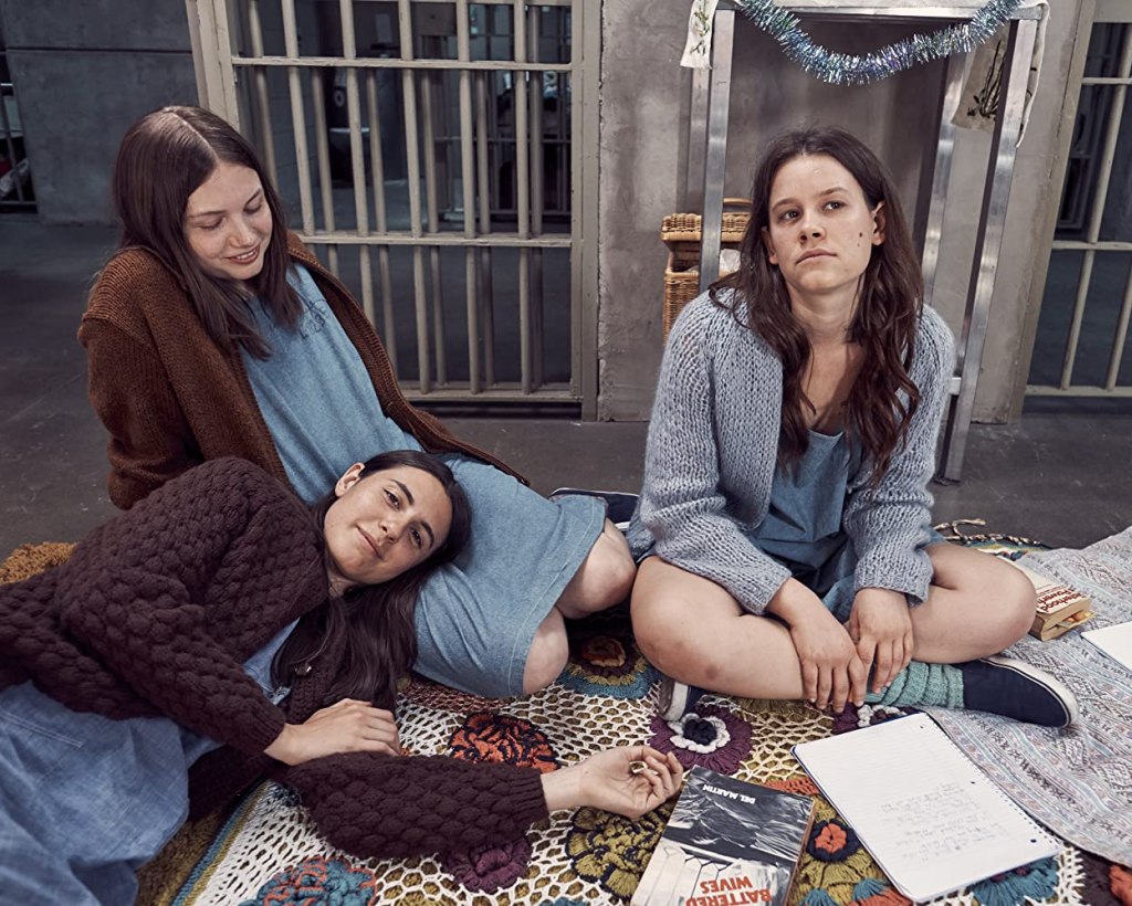 Susan (Marianne Rendón), Leslie (Hannah Murray) and Patricia (Sosie Bacon) in their prison therapy session.