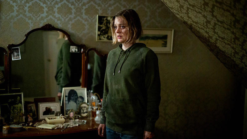 Sam (Bella Heathcote) looking distressed. 