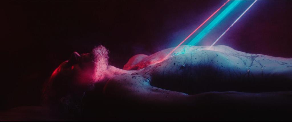 Barry (Gary Green) on the slab as he gets examined by aliens.