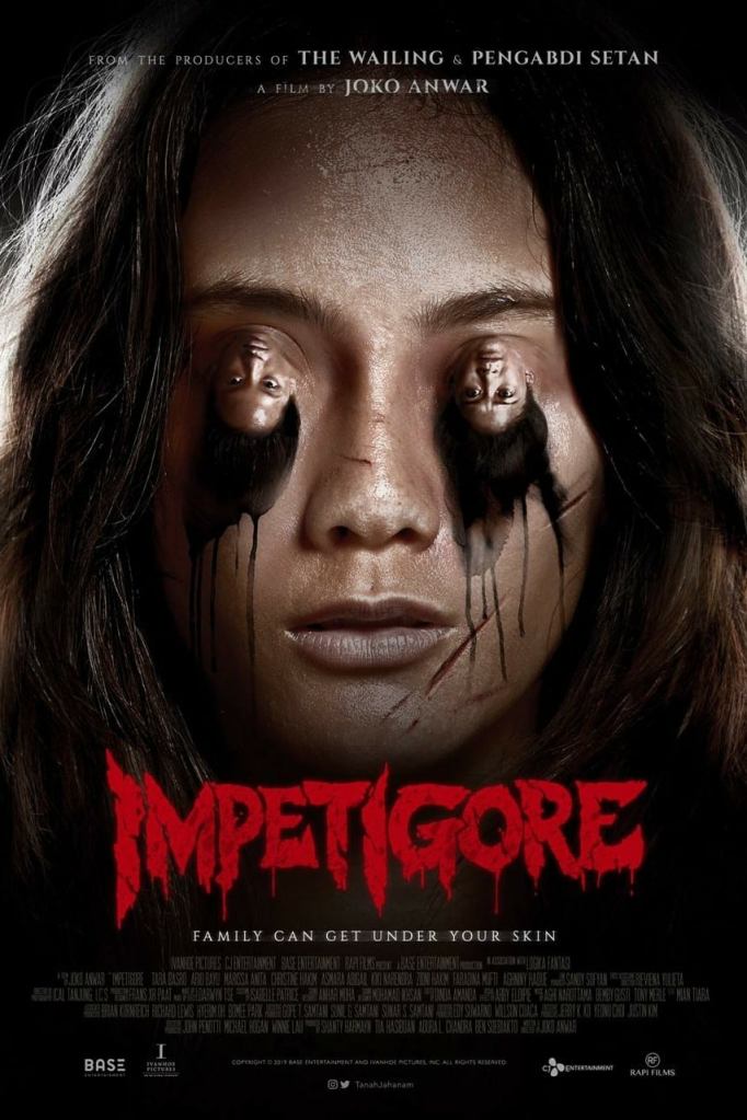The film poster showing Maya's (Tara Basro) face, only instead of her eyes are two upside down heads.