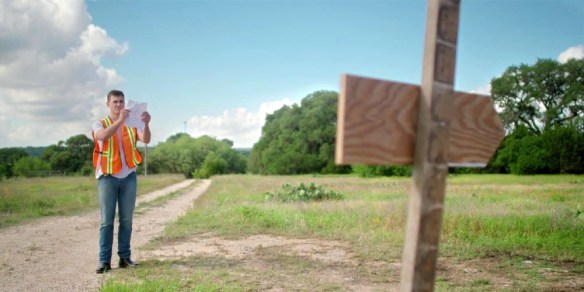 Mike (Jon Michael Simpson) at work