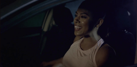 Franchesca (Toni Trucks) in her car.