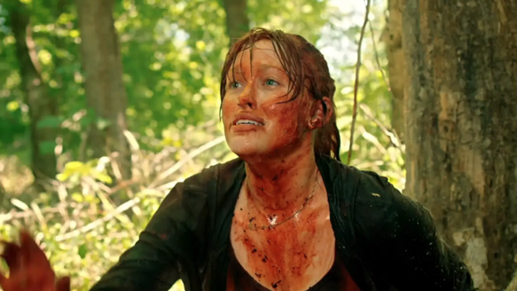 Dawn (Stephanie Thoreson) covered in blood.