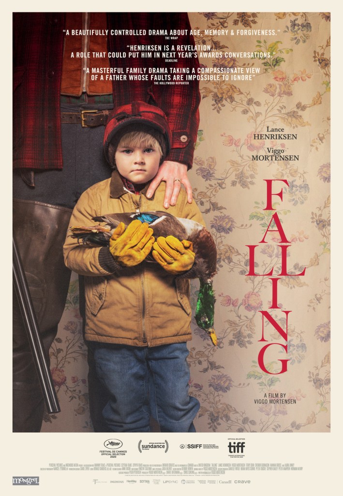 The film poster showing a boy cradling a dead duck. A man is standing behind him with his hand on the boy's shoulder. They are standing in front of a flowery wallpaper.