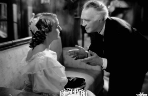 Friedrich Mitterer (Werner Krauss) imploring Leni Schindler (Hortense Raky) . 