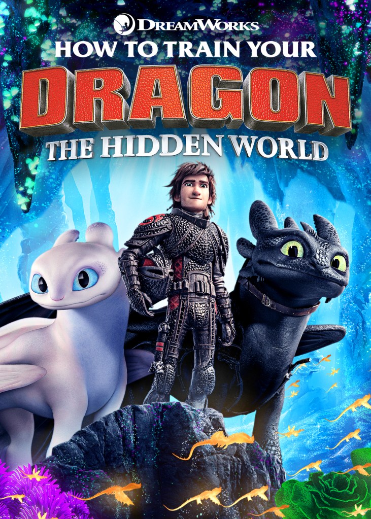 The film poster showing Hiccup (Jay Baruchel) standing together with Toothless and Light Fury.