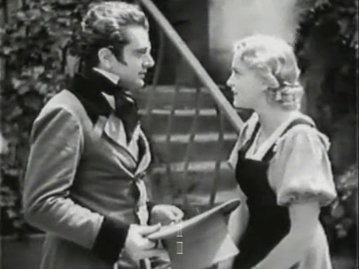 Franz Schubert (Hans Jaray) talking to Emmi (Luise Ullrich). 