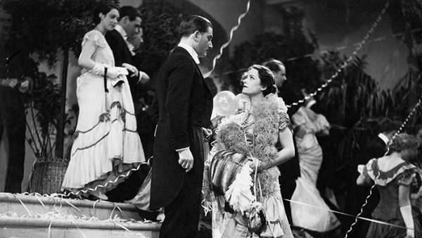 Heideneck (Anton Walbrook) talking to Anita (Olga Tschechowa) at the ball.